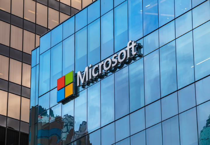 How does Microsoft achieve reach through email marketing?